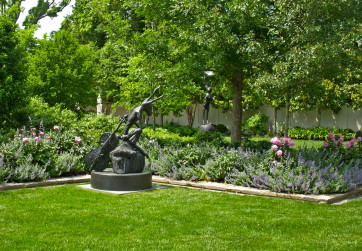 View of two Flanagan sculptures in summer